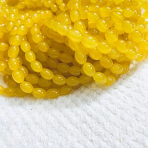 OVALBEADS11- 1 STRAND YELLOW 10 X 8 MM OVAL SHAPED GLASS BEADS