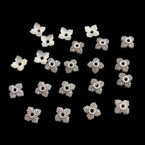 CAPs0015 – 20 GM PACK OF DESIGNER MOTIF SMALL GERMAN SILVER PENDANT (20 GM)