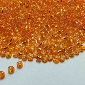 SBEADS0034 ARNAS COPPERISH RED GOLDEN COLOR 11/0 SIZE GLASS TRANSPARENT SEED BEADS (20-40 GM)
